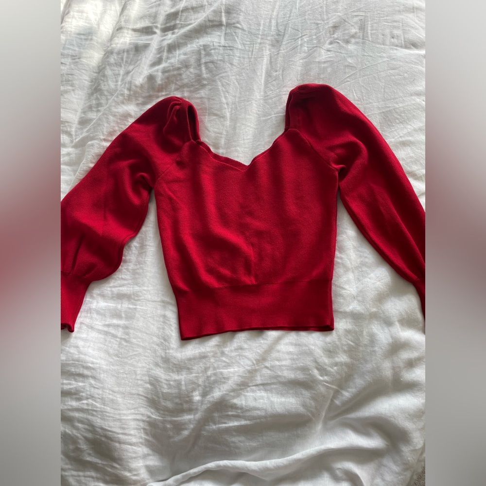 Anthropology red light weight sweater. Worn 1 time. Great for the holidays